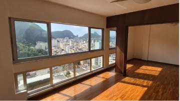 Maravilhoso apartamento com sala ampla em dois ambientes e com vista panorâmica voltada para o bairro de Ipanema/Lagoa e 2 quartos amplos, sendo um suite + Studio. - CPAP22405