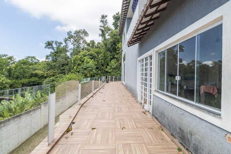 Conheça 02. Varanda 1 do imóvel - Casa em Vargem Grande: Um paraiso na natureza - RECN30013 - 4 02. Varanda 1 - 4