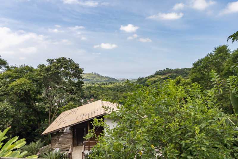 Conheça 02. Vista da Varanda 4 do imóvel - Casa em Vargem Grande: Um paraiso na natureza - RECN30013 - 6 02. Vista da Varanda 4 - 6