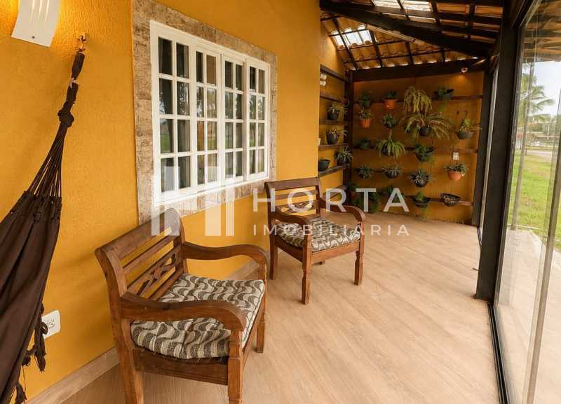 Conheça varanda externa. do imóvel - Búzios! Casa em condomínio c/ 5 suítes, sauna e piscina. - CPCN50002 - 28 varanda externa. - 28