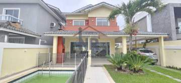 Casa com 4 suítes, dependência completa, Condomínio fechado. - NR001274