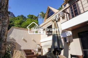 casa com 4 quartos sendo 1 suíte na barra da tijuca - RJCN40010
