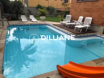 Imperdível - Diluane Imóveis Vende. Excelente Casa Estilo Colonial com Projeto integrado ao meio ambiente Piscina Garagem 8 carros. - NTCA40022