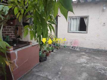 Terreno com 2 casas linear e 2 vagas de garagem a venda em Vista Alegre Rj - CA00911