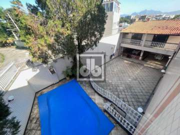 Ilha do Governador - Jardim Guanabara - Casa - À Venda - Varandão - 4 Quartos (4 Suítes) - Closet - Sala TV - Cozinha Planejada - Área Lazer - Piscina - Sauna - Churrasqueira - 10 Vagas de Garagem - Julio Bogoricin - JBI61092