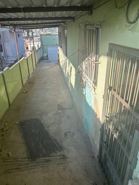 Corredor lateral / Garagem. - 14