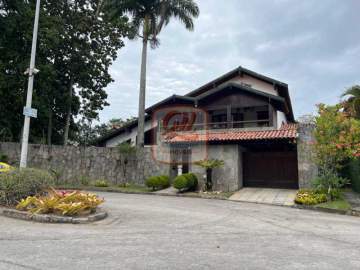 CASA DUPLEX CONSTRUIDA EM ESTILO RÚSTICO, EM TERRENO DE 1180 M², À VENDA NO CONDOMÍNIO PEDRA DE ITAÚNA NA BARRA DA TIJUCA. - cs3297