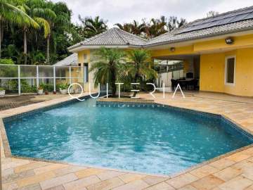 Casa triplex espetacular em condomínio com segurança 24h na Barra da Tijuca! - MQCN50028