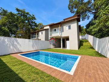 Casa com Piscina à Venda em Terra Preta | 3 Dormitórios e Área Gourmet - NGCH30038