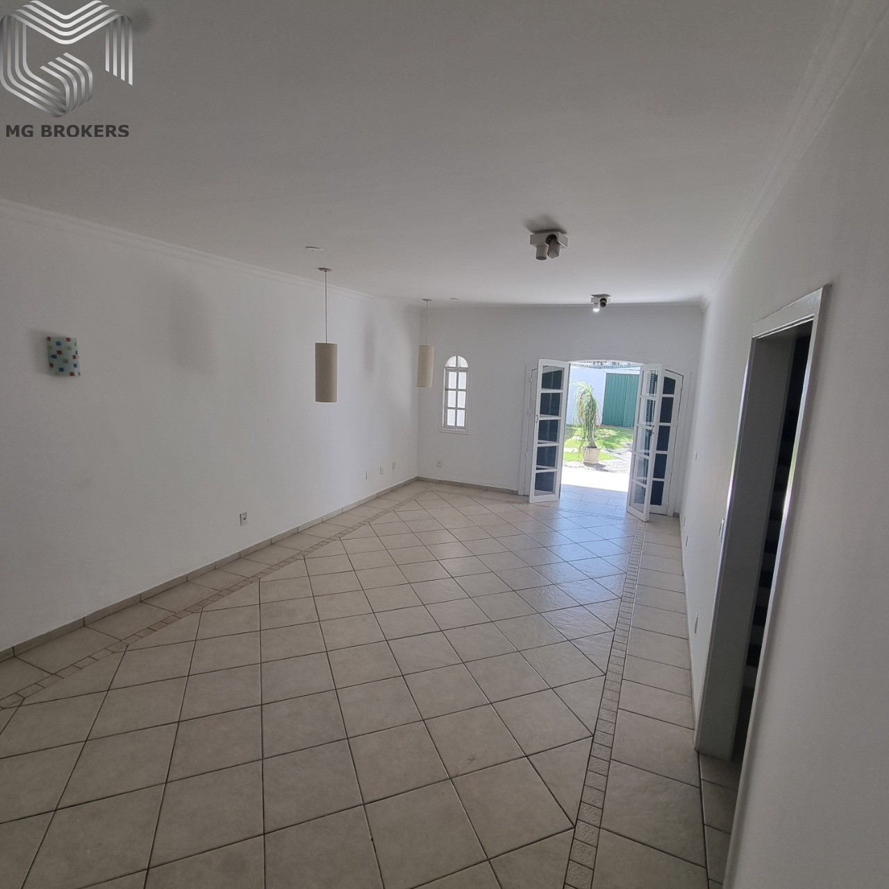 Conheça Salao em 3 ambientes do imóvel - Casa em Condomínio à venda Rua Professora Isabel Monerat, Recreio dos Bandeirantes, Rio de Janeiro - R$ 1.900.000 - MGB0470 - 7 Salao em 3 ambientes - 7