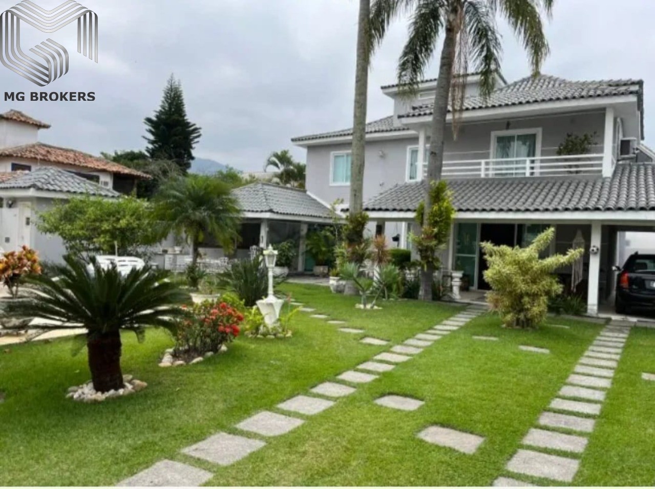 Conheça Foto 01 do imóvel - Casa em Condomínio à venda Avenida Di Cavalcanti, Barra da Tijuca, Rio de Janeiro - R$ 4.990.000 - MGB0475 - 1 Foto 01 - 1