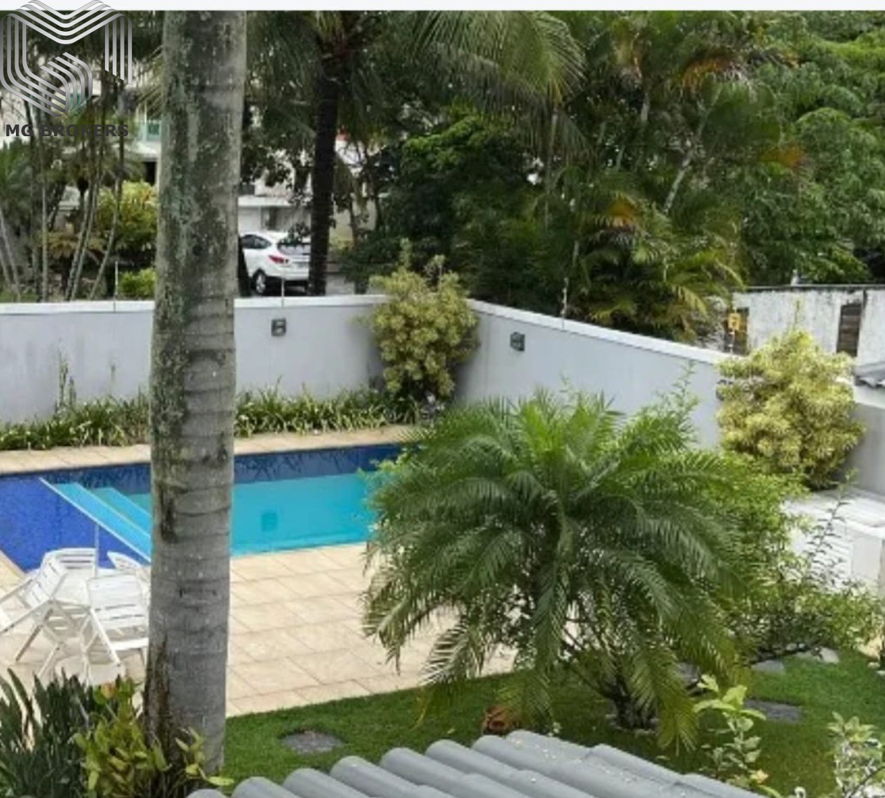 Conheça Foto 02 do imóvel - Casa em Condomínio à venda Avenida Di Cavalcanti, Barra da Tijuca, Rio de Janeiro - R$ 4.990.000 - MGB0475 - 2 Foto 02 - 2