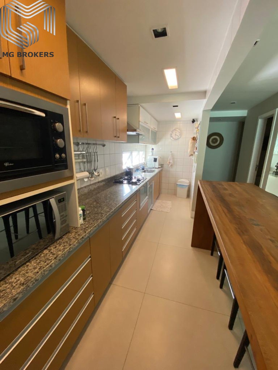 Conheça Foto 05 do imóvel - Cobertura à venda Avenida Afonso de Taunay, Barra da Tijuca, Rio de Janeiro - R$ 2.700.000 - mgafonso - 5 Foto 05 - 5