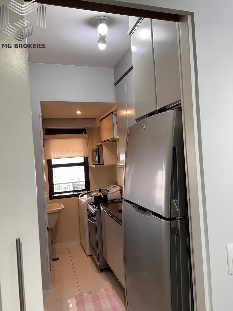 Conheça Foto 01 do imóvel - Apartamento à venda Avenida Prefeito Dulcídio Cardoso, Barra da Tijuca, Rio de Janeiro - R$ 765.000 - MGB0417 - 14 Foto 01 - 14