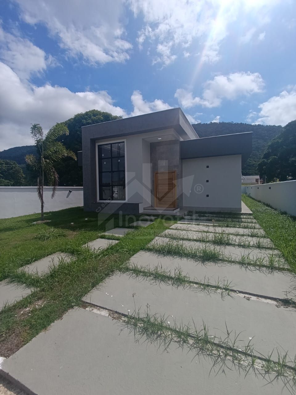 Frente da casa ângulo 1 - 1