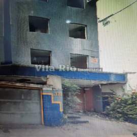 Vende-se terreno com prédio comercial na Praça da Bandeira. - VHT00001