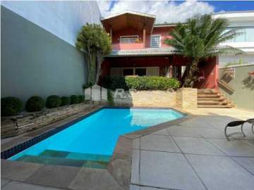 AGENDE SUA VISITA! - Casa com 3 suítes, 2 vagas de garagem e piscina, condomínio Pedras Douradas - Jacarepaguá Rj. - VVCN30271