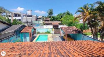 Casa de Rua à Venda - 4 Dormitórios - Taquara - 230 m² com Piscina, Churrasqueira e 4 Vagas - R019