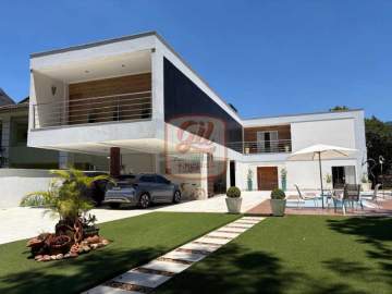 A MELHOR E MAIS MODERNA CASA DO CONDOMÍNIO ,COM ENERGIA SOLAR E TERRENO DE 790 M - CS3638